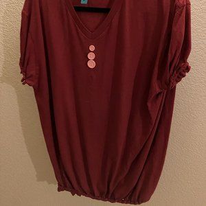 250 maroon v-neck tee with braided arms and waist with button accents